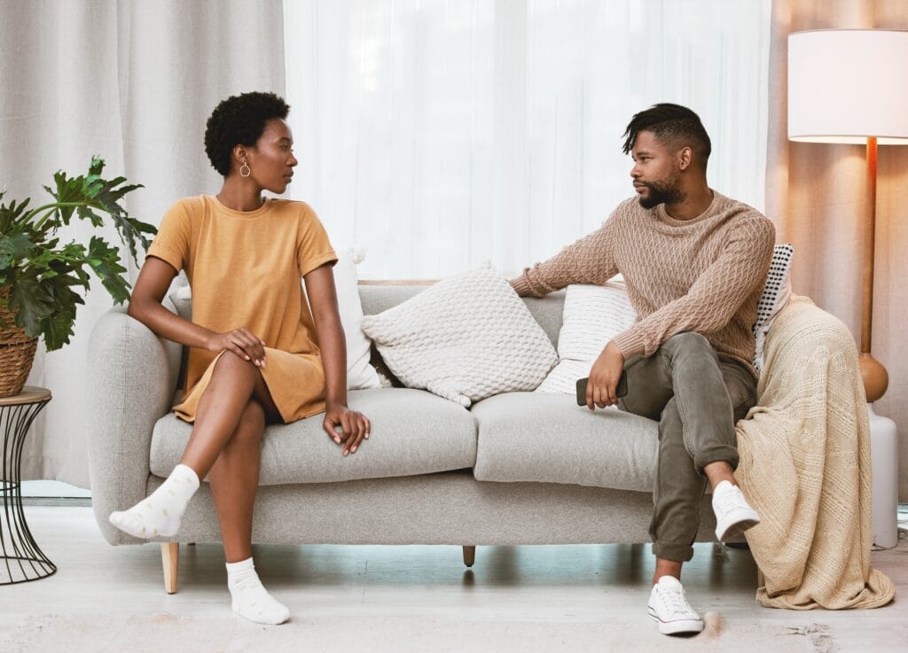 Were on the same team against this issue. Shot of a young couple having an argument at home.