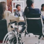 355 identity based words censored by u. S. Administration under trump (2025-present)-a disabled company employee is able to work happily with colleagues in the office.
