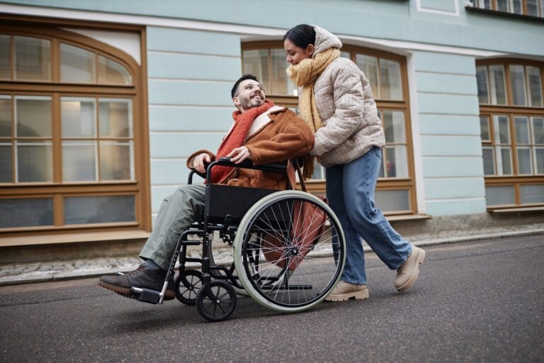 Accessibility Audit: 7-Step Checklist for Inclusive Dating-Young couple with man in wheelchair in date together in city